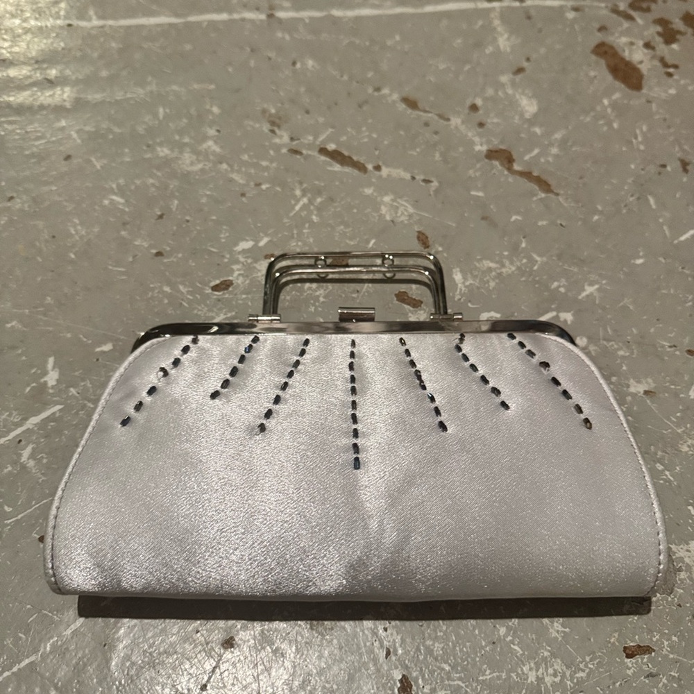 Designs Silver Clutch Bag